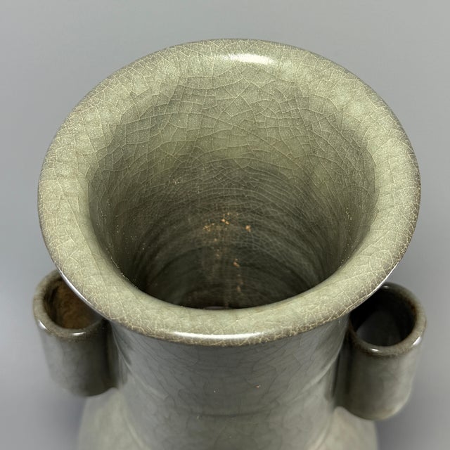 Fine Chinese Longquan celadon arrow vase with classic tubular pierced handles on both sides. Covered in soft grey‑green...