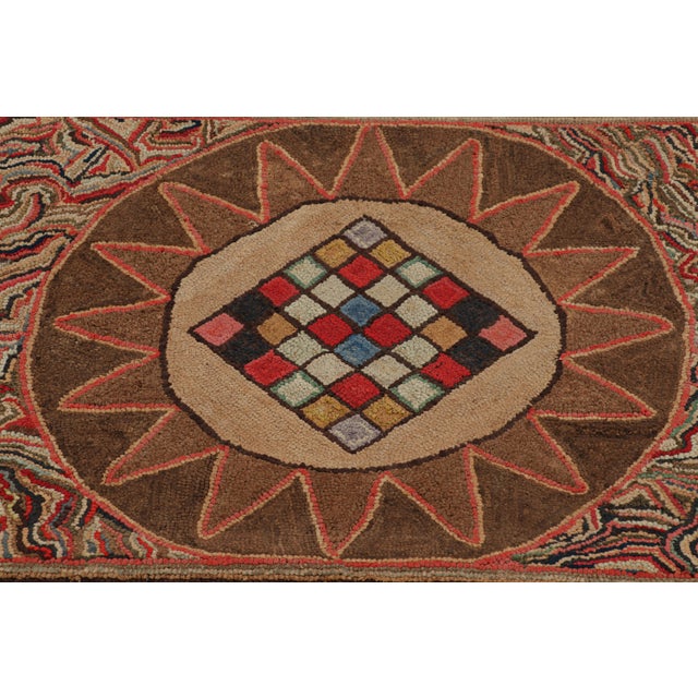 Handmade in wool and originating circa 1920-1930, this 2x3 rug is a rare and exciting new curation in Rug & Kilim’s...