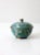 This is an antique Chinese cloisonne box circa 1890-1920. The beautiful turquoise blue enamel covered copper bowl has a...