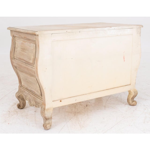 French Provincial Style Distressed Wood Bombe Chest of Two Drawers, with carved floral accents, metal foliate form pulls,...