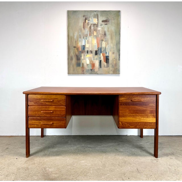 A teak circa 1970’s 4-drawer executive desk by Vi-Ma Mobler Denmark. Top has been professionally restored in high-...