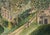 An evocative original mid-century watercolor landscape, signed and dated 1950, depicting a verdant rural scene from an...