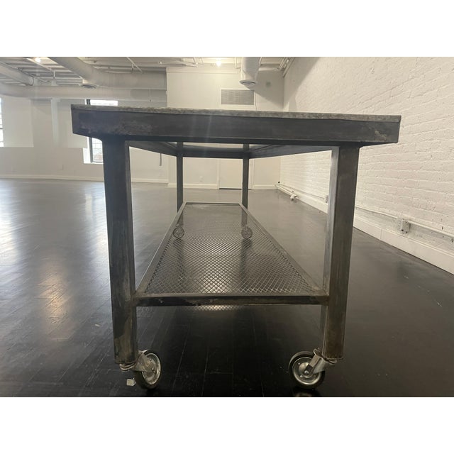 Vintage style metal industrial table on wheels, circa 2000 Industrial table made of steel on wheels. *Additional shipping...