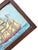 A vintage folk art ship painting, hand-painted on a carved wooden panel with a dark wood surround. The piece features a...