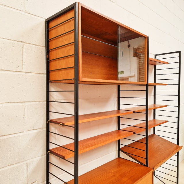 Vintage Two Bay Danish Wall Unit by Robert Heal for Heals Staples Ladderax, 1960s, in Good conditions. Designed 1960 to...