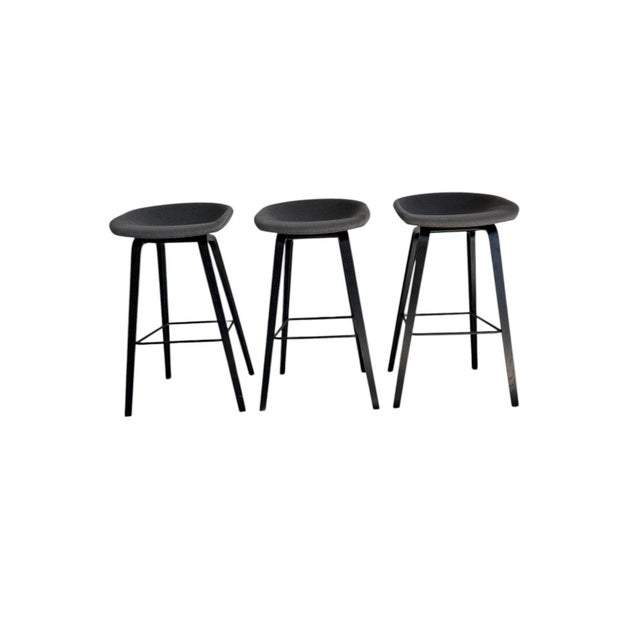 Beautiful set of three modern Scandinavian bar stools designed by Hee Welling for HAY. Features sculpted upholstered seats...
