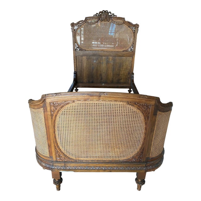 Early 20th Century Antique Carved Wood and Cane Twin Bed For Sale