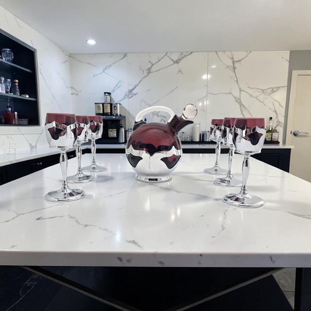 A striking American Art Deco barware ensemble by Farber Bros., New York, dating to the early 1930s and bearing the August...