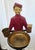 The product is a 1920s or 1930s cast iron "Johnny" Philip Morris bellboy advertising smoking stand. This ashtray stand,...