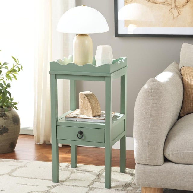 Elevate your space with the Darlyn One Drawer Accent Table in a serene Sand color. This versatile piece features a single...