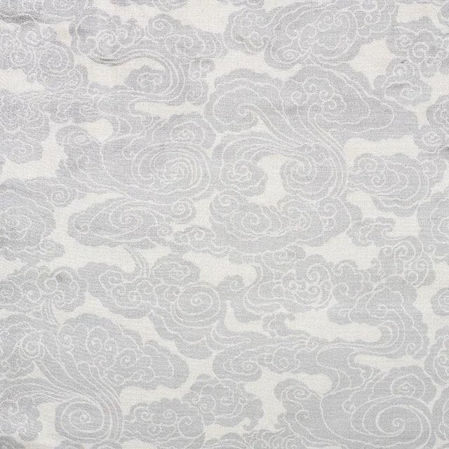 Derived from an antique Chinese drawing of billowing clouds, a traditional symbol of good fortune, this dramatic pattern...