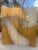 This is a Screen that is attributed to Maitland Smith with a background of gold leaf and two peacocks that are done in a...