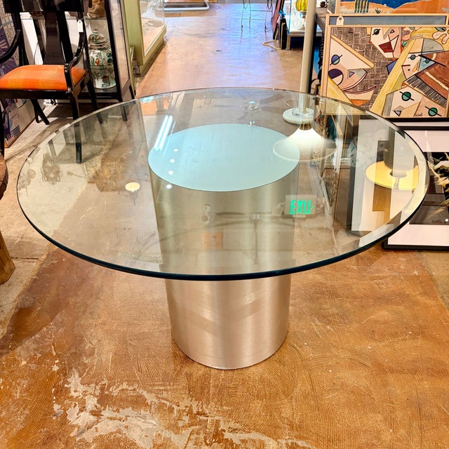 Bold, architectural, and effortlessly chic, this vintage modernist dining table makes a striking statement through its...