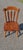 Rustic Vintage Wooden Spindle-Back Chair This charming Rustic Vintage Wooden Spindle-Back Chair boasts a sturdy wood...