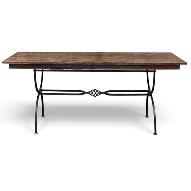 Centuries of character meet the enduring craftsmanship of hand forged iron in this Country French style dining table. The...