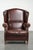Offered by ByThijs: this elegant vintage sheepskin wing armchair with a timeless English look, finished with decorative...