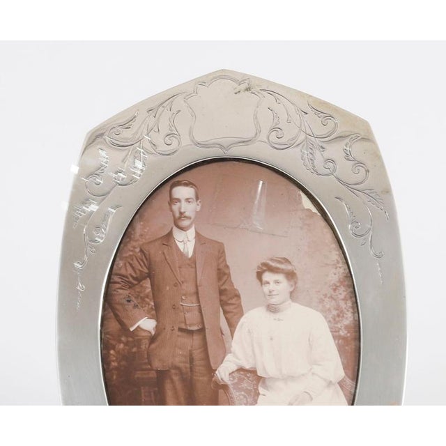 A superb decorative Georgue V antique sterling silver photo frame by Joseph Gloster Ltd, Birmingham with hallmarks for...