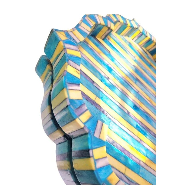 A gorgeous and striking tessalated blue, yellow and navy unusual shaped serving tray. The tray is made of some sort of...