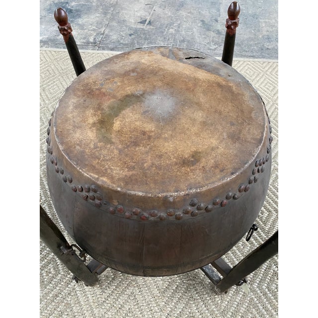 Antique Chinese Drum with stand. The drum alone measures: 21” width from top 27” width from middle 22.5 height