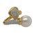 18k Bypass ring with 12mm South Sea pearl and 0.81 carats of pave set round diamonds 13.24 grams size 6.75