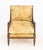 Regency Style Mahogany Caned Bergere, with beige floral cushions on turned wood tapered legs. 31" H x 23.5" W x 27.5" D;...