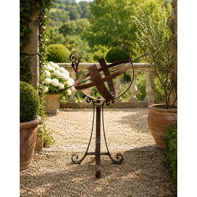A beautifully crafted large iron armillary sphere, evoking the timeless elegance of classical European gardens. Pieces...