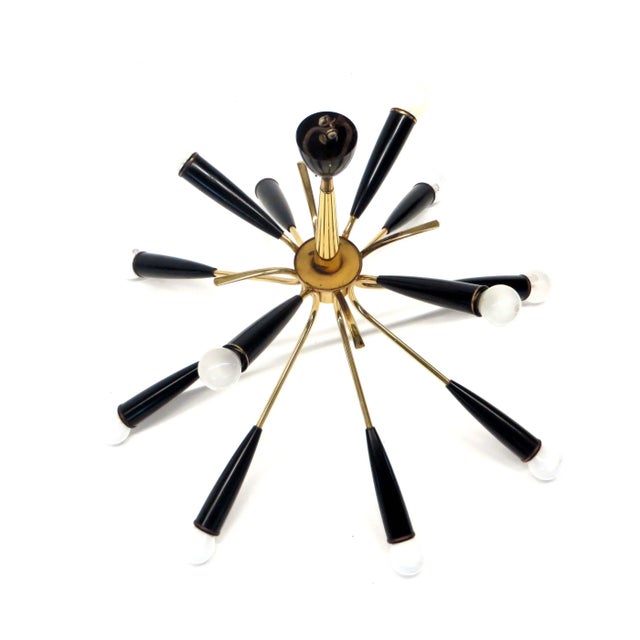 Italian Vintage Hanging Lamp Stilnovo Style Made of Brass with 12 Light Points, 1970s, in Good conditions. Designed 1970...