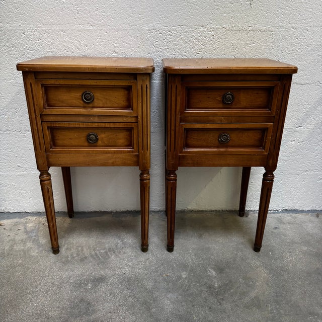 Pair of Louis XVI style bedside tables, mid-20th century. French Furniture Made of natural wood, likely oak, the tables...
