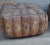 A set of 2 vintage Egyptian patterned leather poufs.