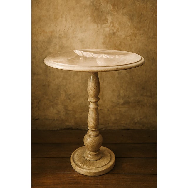 Handcrafted from premium natural marble, this round side table adds timeless elegance to any space. Its unique veining...