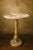 Handcrafted from premium natural marble, this round side table adds timeless elegance to any space. Its unique veining...