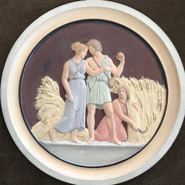 Rare hand-painted intaglio on dark brown velvet in silver gilt frame. Scene pictures two Grecian lovers walking holding a...