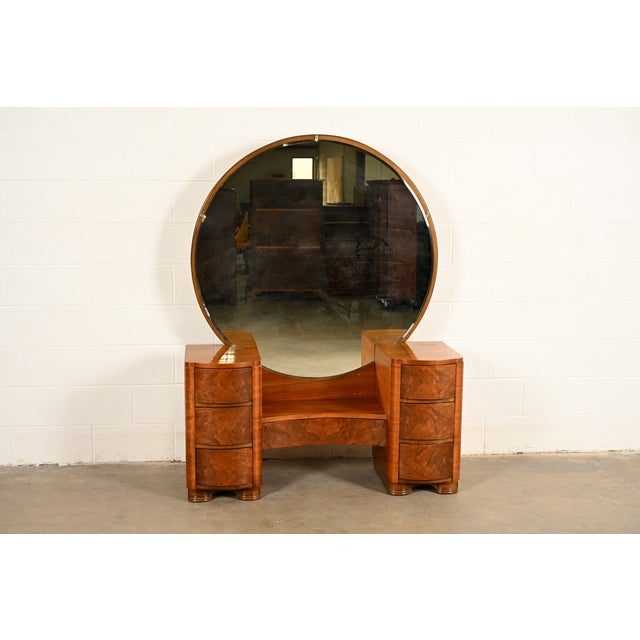 A gorgeous antique Art Deco vanity or dressing table with mirror In the manner of Donald Deskey By Joerns Bros. Furniture...