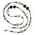 This is part of Chairish’s Fine Jewelry assortment. This is a lovely, long white Coin Pearl and Black Onyx necklace that...