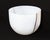 A glass "Rainbow" bowl designe by the Swedish glass artist Bertil Vallien (born 1938) for Kosta Boda. This primarily white...