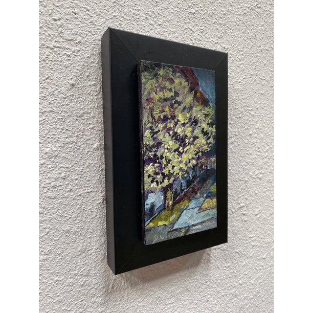 This oil on panel artwork captures a serene nocturnal scene featuring a crab apple tree, its blossoms glowing softly...
