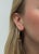 In a sleek and modern heart design, these Tiffany & Co. hoops designed by Elsa Peretti, are a classic staple perfect for...