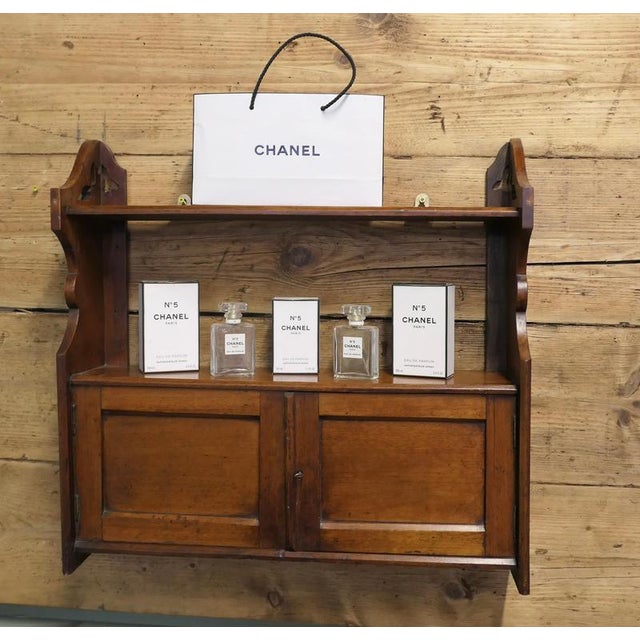 2 Door Walnut Wall Cabinet A great little piece, made in walnut, the cabinet has a top shelf and storage inside the 2 door...