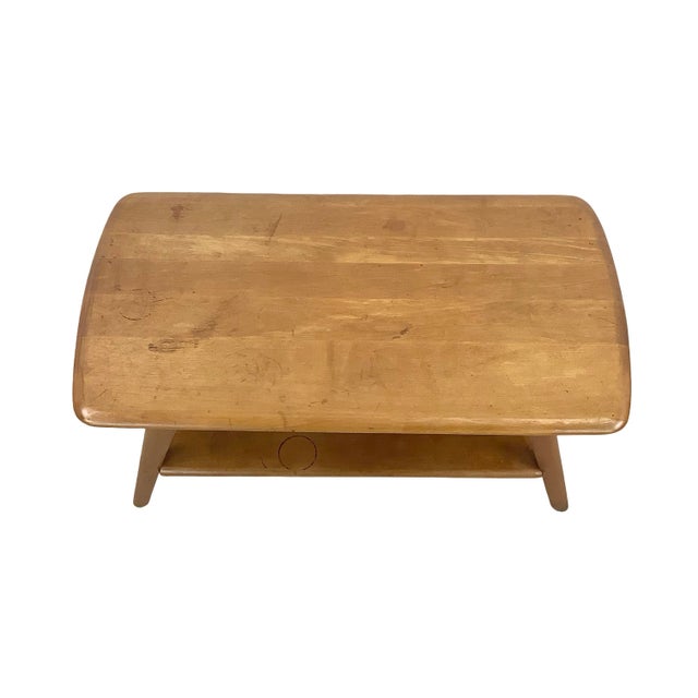 A study in restrained Mid-Century Modern design, this small-scale, solid wood coffee table brings the warmth of blonde...