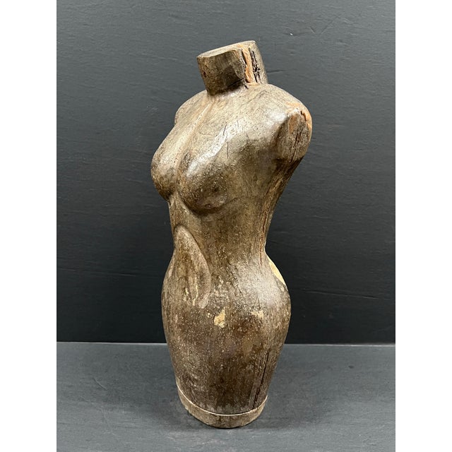 Late 20th Century Carved Solid Wood Female Torso Sculpture AGES: Late 20th Century MATERIALS: Wood COUNTRY: Philippines...