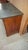 Empire period walnut commode, 19th century, with a marble top. This commode rests on three drawers and features two half-...