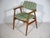 Danish mid-century armchair, model GM11, in teak by Erik Kirkegaard for Glostrup Møbelfabrik, 1960s. Solid teak frame with...