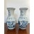 This is a beautiful pair of chinoiserie blue and white vases with Greek Key motif around the top edges as well as cherry...