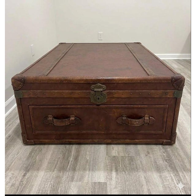 Stunning leather trunk from a retired RH collection. Beautiful high-quality leather with ample storage. Pull out drawers...
