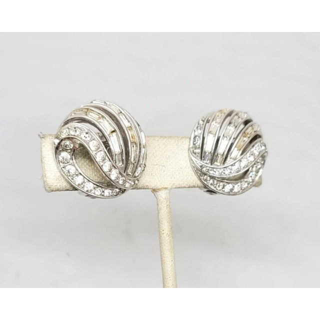Boucher Vintage Late 1950s Signed Boucher Round Rhodium Plated Baguette & Round Clear Rhinestone Clip Earrings - 2 Pieces For Sale - Image 4 of 11