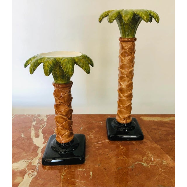 Beautiful set of Palm Trees ceramic candle holders to finish your table decor. Larger one 12”H x 6”W Medium 9”H x 6”W