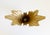 A striking mid-century Hollywood Regency-style, aged brass winged centerpiece bowl. It features a dramatic, sculptural...