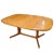 Mid-century extending teak dining table by dyrlund. The table has 2 leaves which store within the table. manufacturer -...