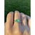 Unique kite shape natural Colombian Emerald, mounted in 18k rose gold and set on a curved regal band with luminous natural...