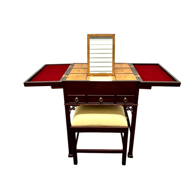 This exquisite, vintage piece from the esteemed Baker Furniture company is a highly desirable Chinese Chippendale style...